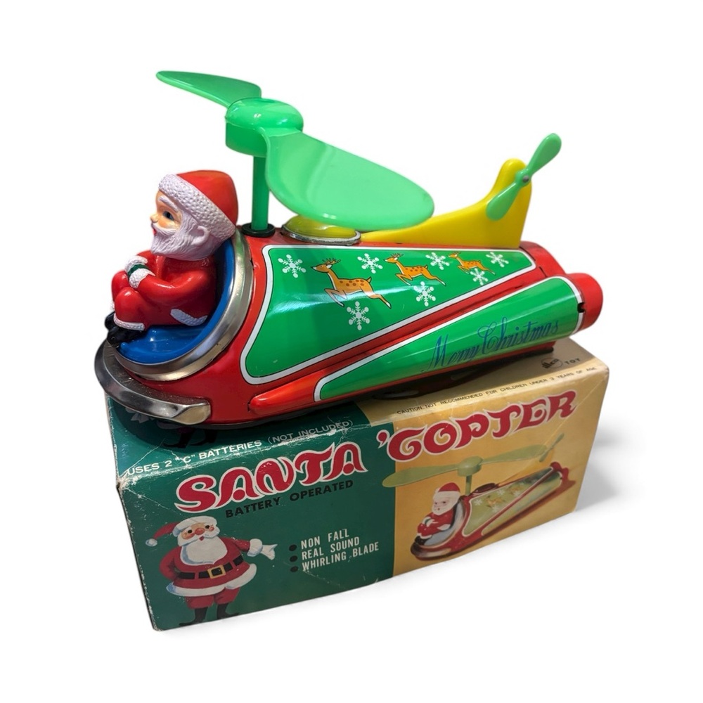 Vintage 1960’s Santa Copter Tin toy in original box - tested and works.